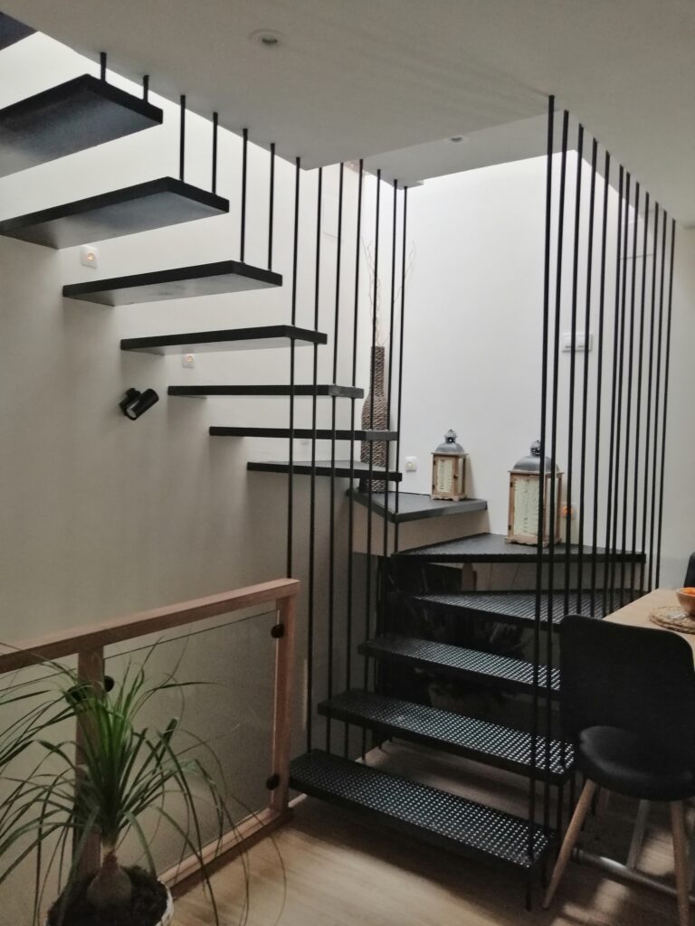 rehabilitacion vivienda, escalera, luz cenital, lucernario